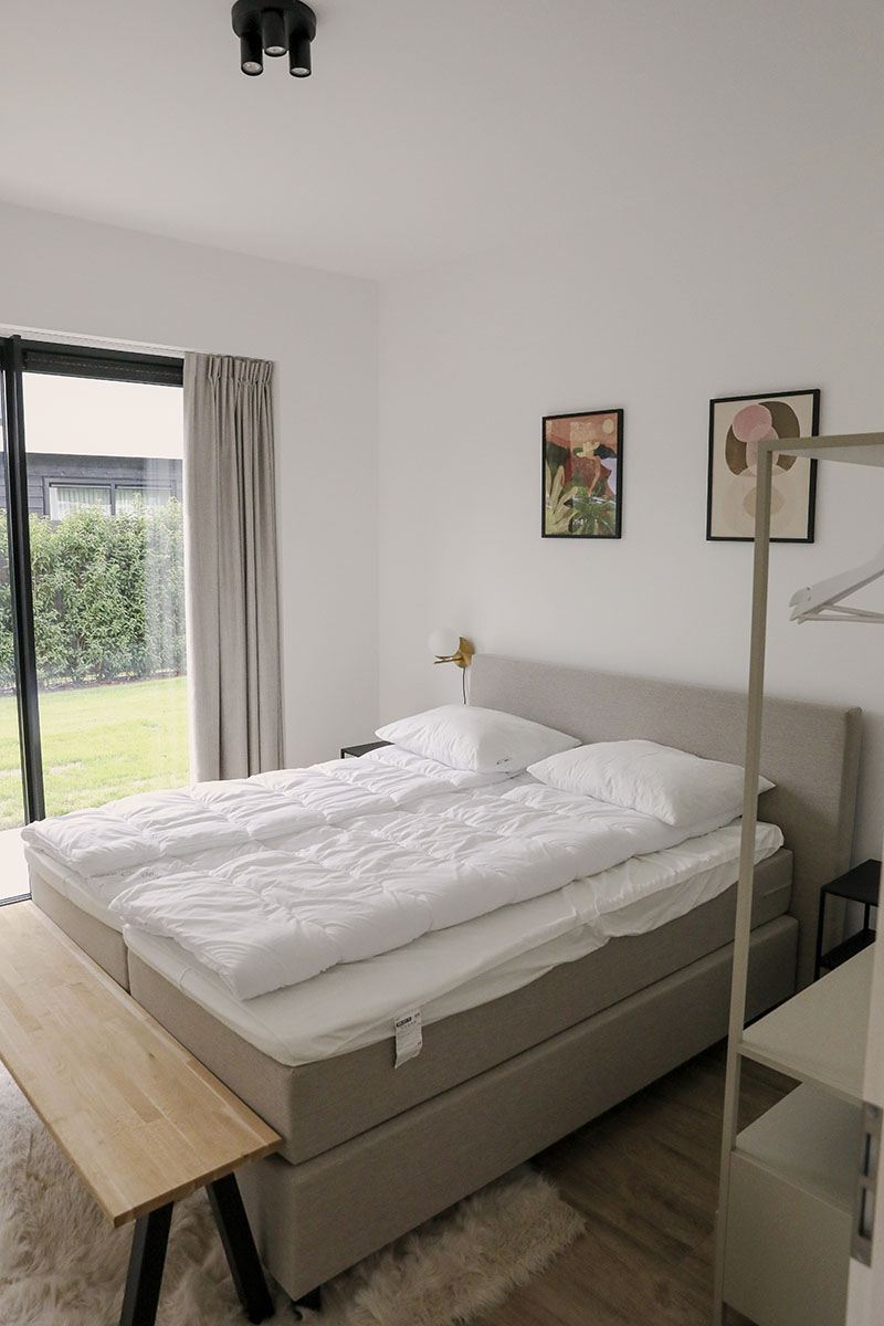 Slaapkamer in een ruim vakantiehuis op Harderwold